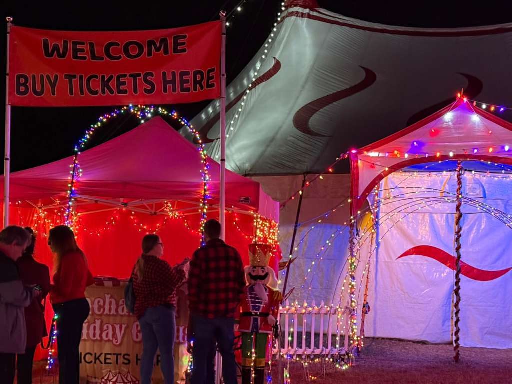 Lit Santa’s Village entrance and tents